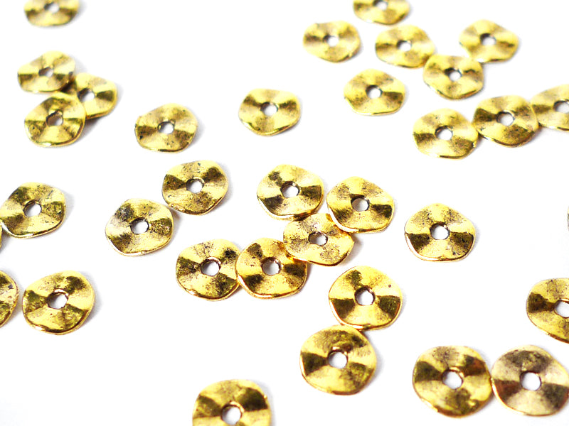 Metallperlen “Mini-Donut“ in gold 7 mm - 20 Stück