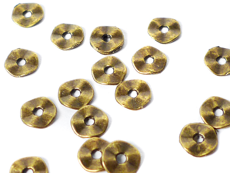 Metallperlen “Mini-Donut“ in bronze 7 mm - 20 Stück