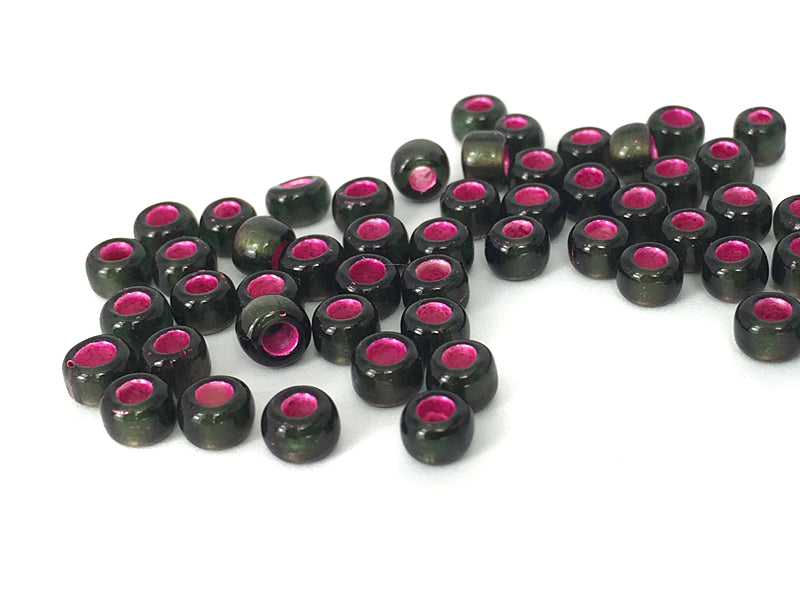 TOHO Beads / Rocailles 6/0 - 4 mm in dunkelgrün / pink - 10g