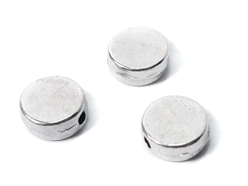 Metallperlen Spacer “Button“ 7 x 3 mm - 100 Stück